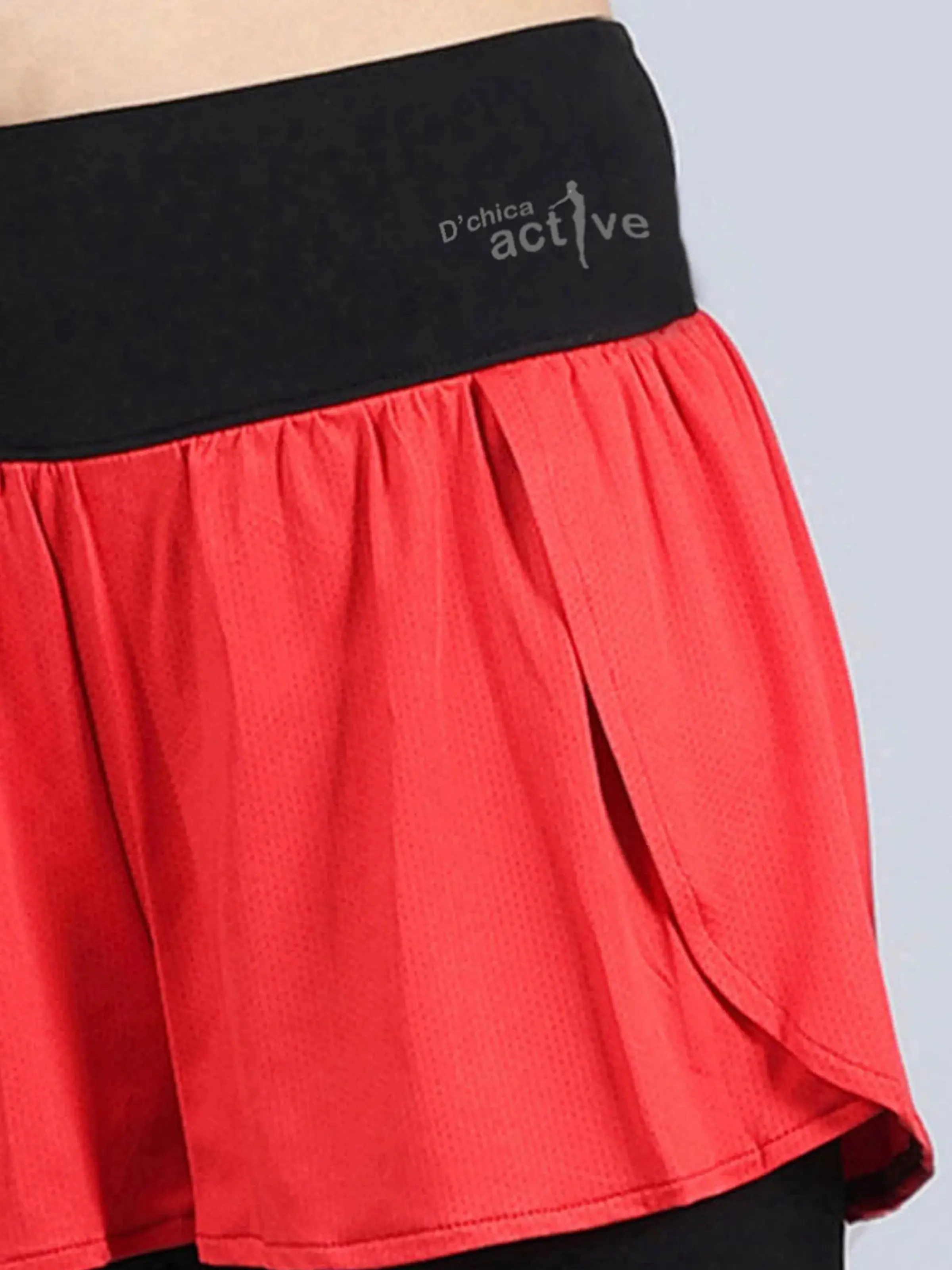 Overlapping Shorts with Red Leggings and Side Pocket